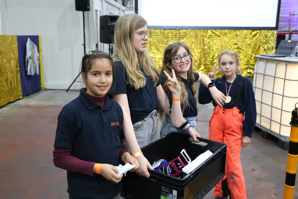 Young people taking part in a LEGO club activity